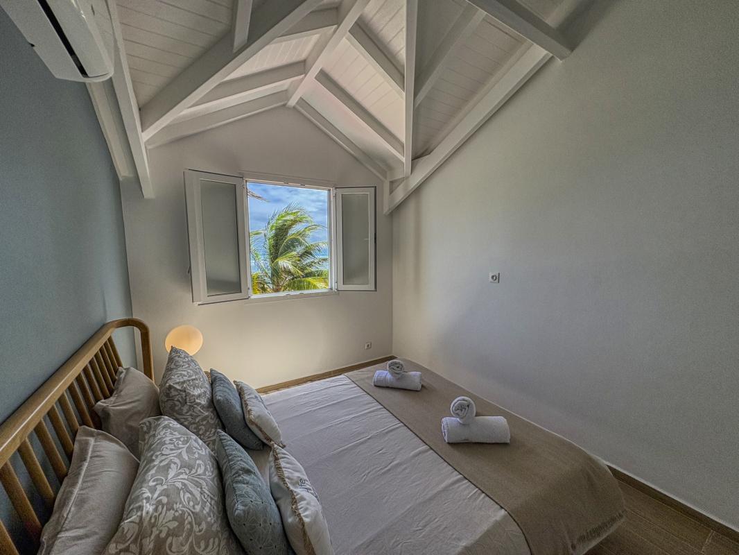 32.Location villa pied dans l'eau Saint François Guadeloupe_Chambre 2 Etage